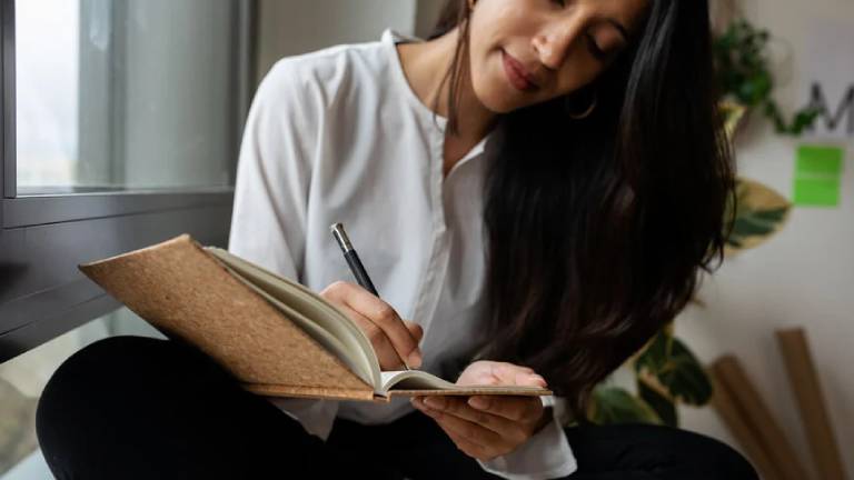 stoic woman journaling